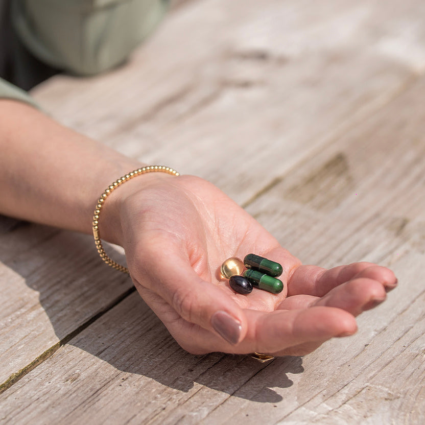 Supplementen hand pillen zon